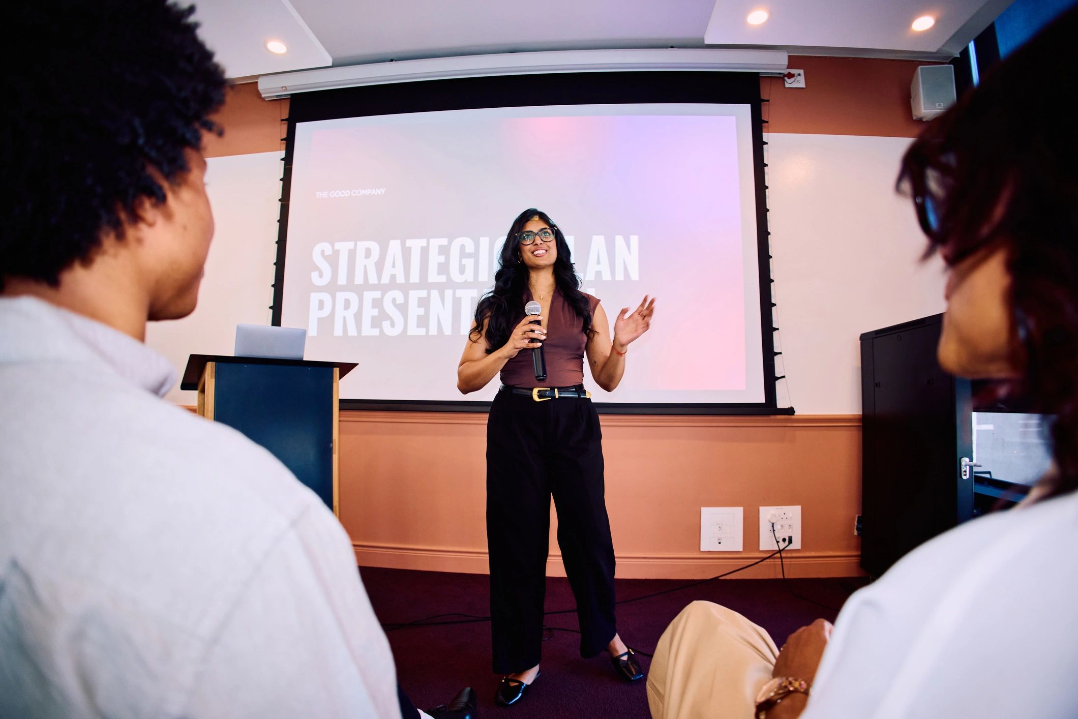 Executive presenting strategy to colleagues