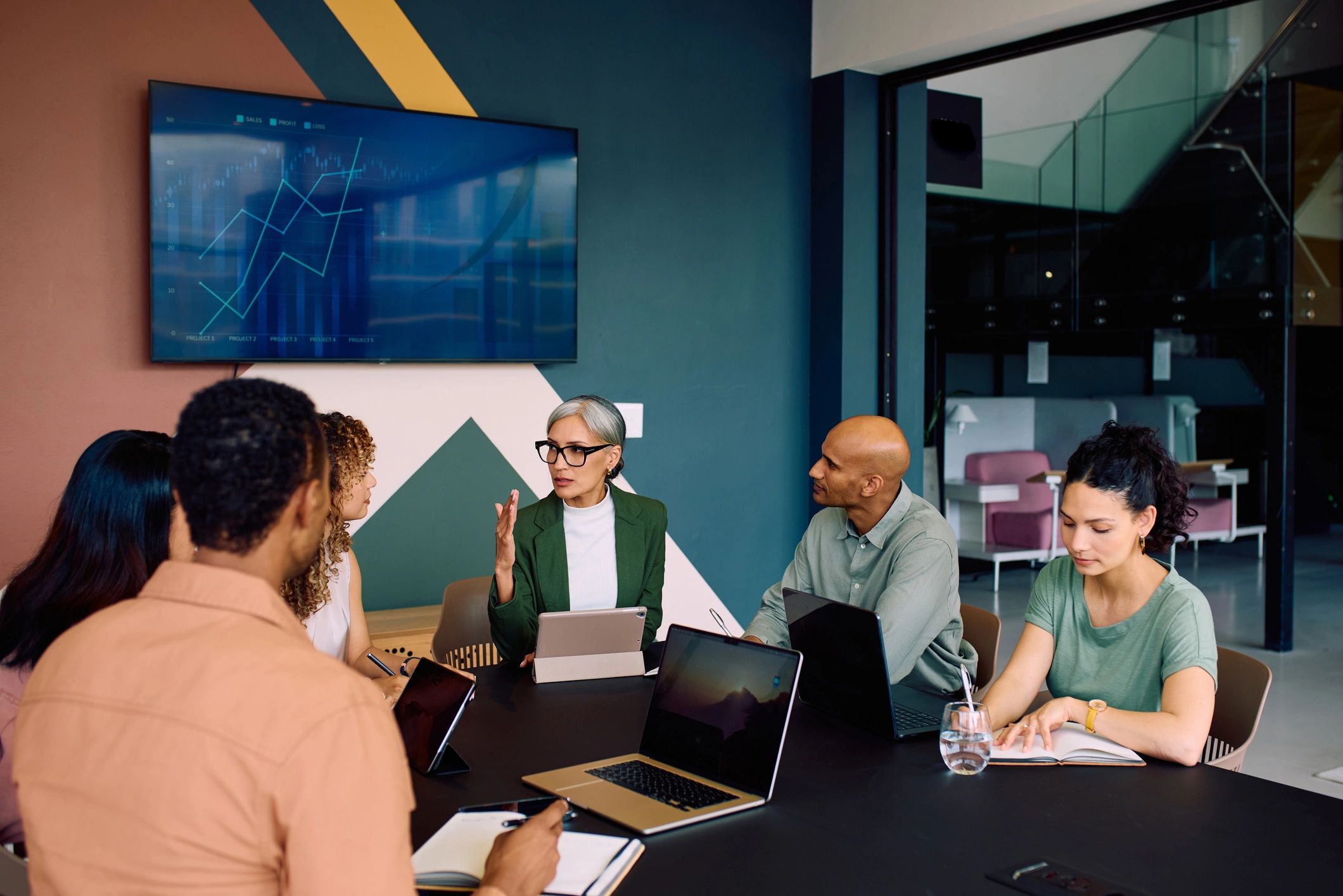 Business leaders reviewing technology governance priorities in a meeting